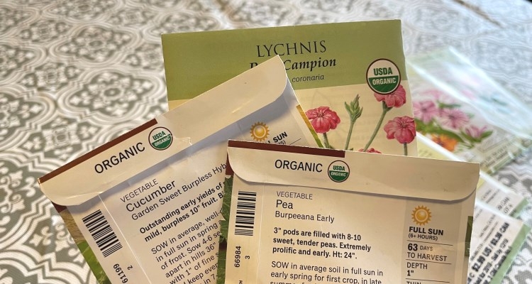 seed packets printed with the USDA certified organic logo